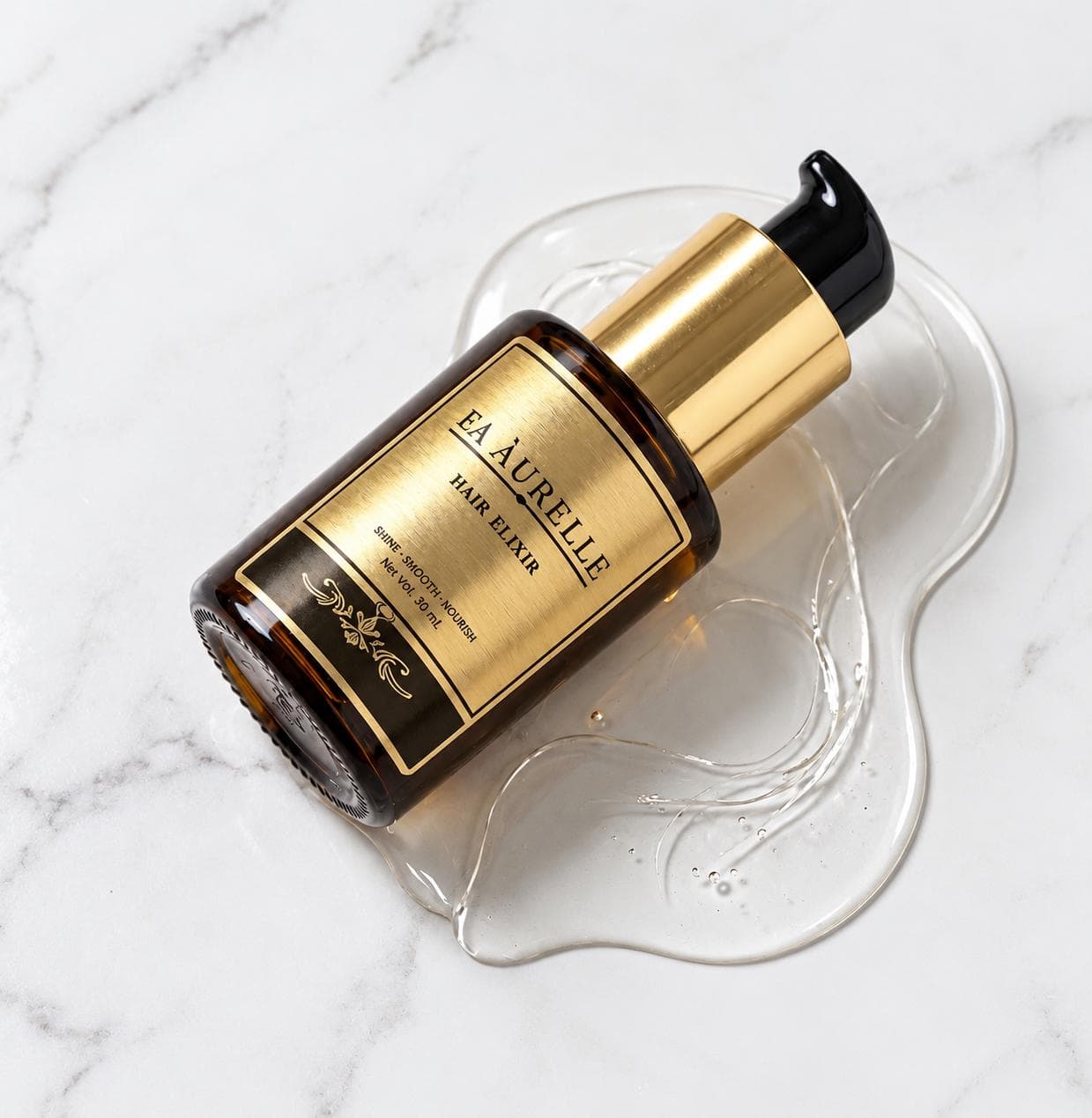 FA ÀURELLE Hair Elixir bottle arranged with serum on a marble surface