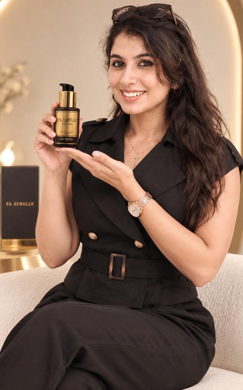 FA ÀURELLE founder holding the Hair Elixir